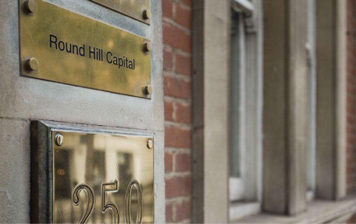 Round Hill Capital door sign