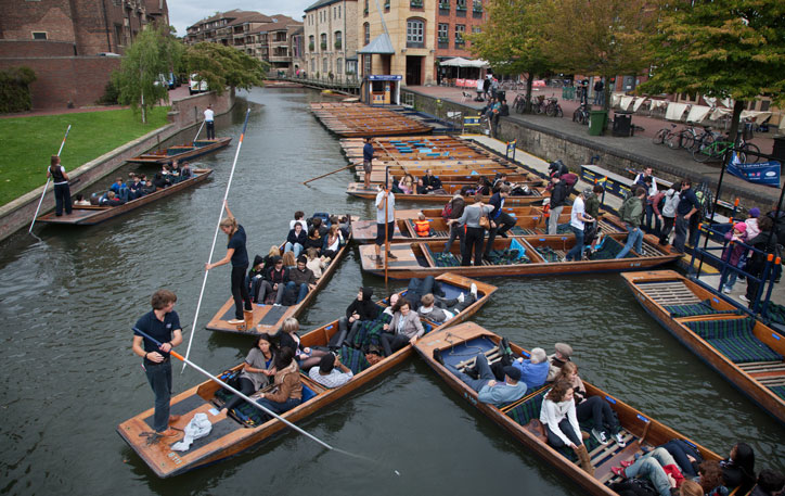 A selection of punts on the river in Cambridge