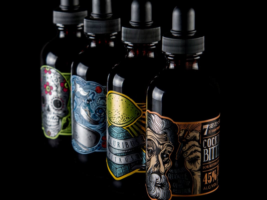 Artisanal Cocktail Bitters Bottles Dark Studio Lighting