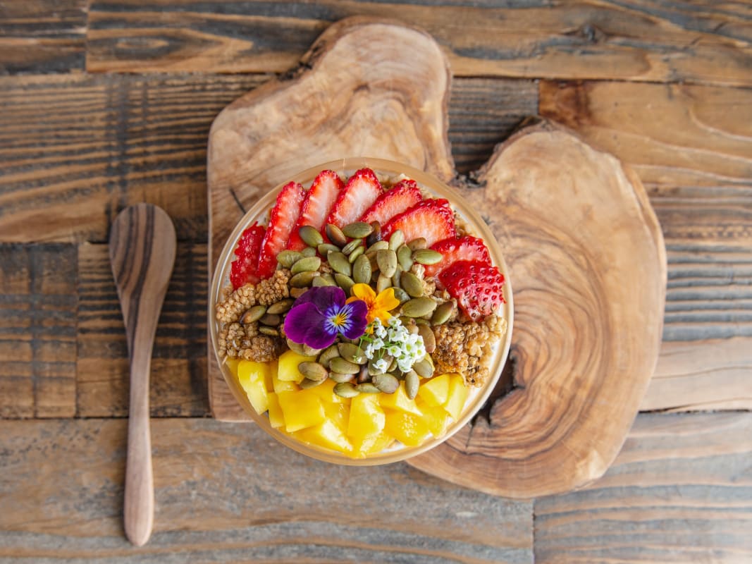 Colorful Smoothie Bowl Fresh Fruit Toppings Rustic Wooden Board