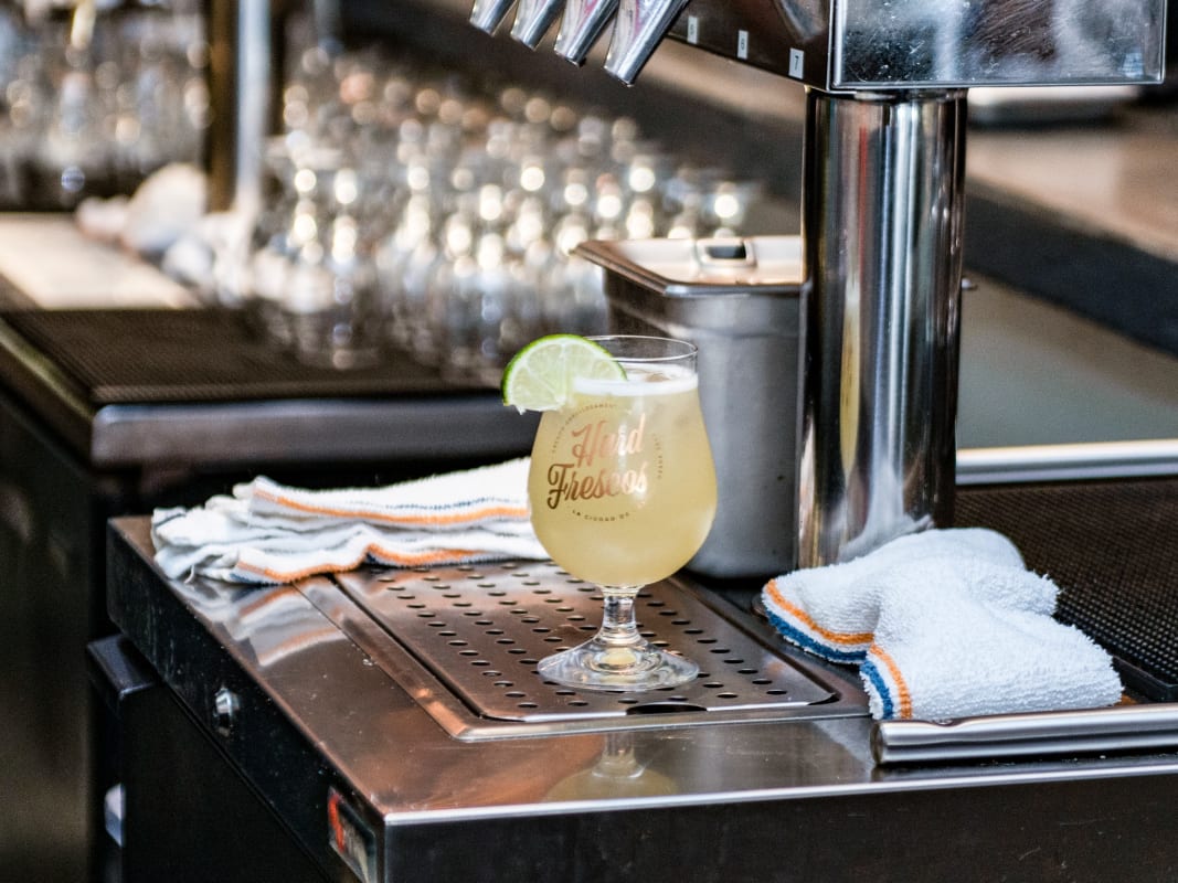 Craft Cocktail Lime Garnish Professional Bar Setup