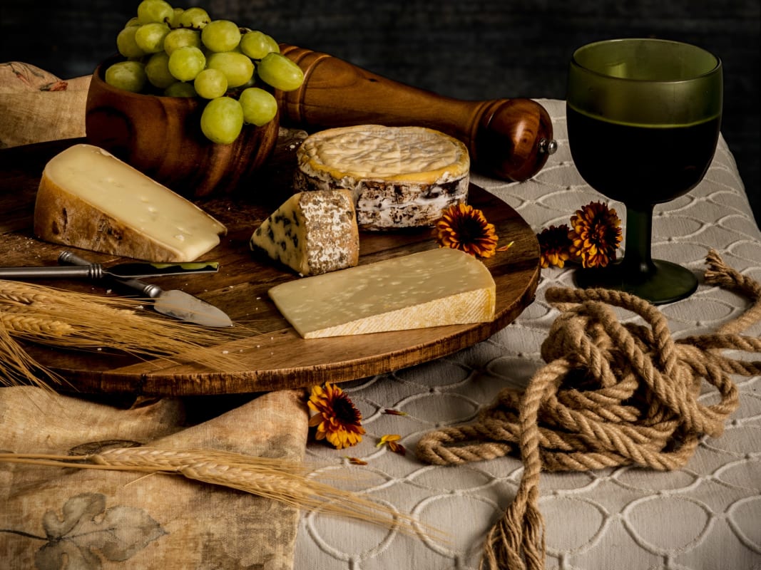 Rustic Cheese Board Wine Grapes Wooden Table Still Life