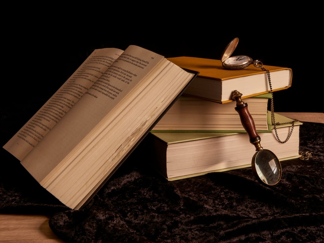 Vintage Books Magnifying Glass Still Life Dark Background