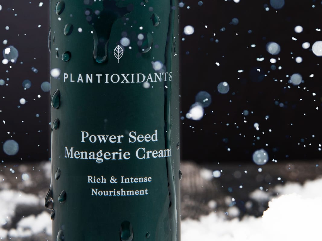 Plantioxidants Skincare Bottle Holiday Bokeh Lights Water Drops