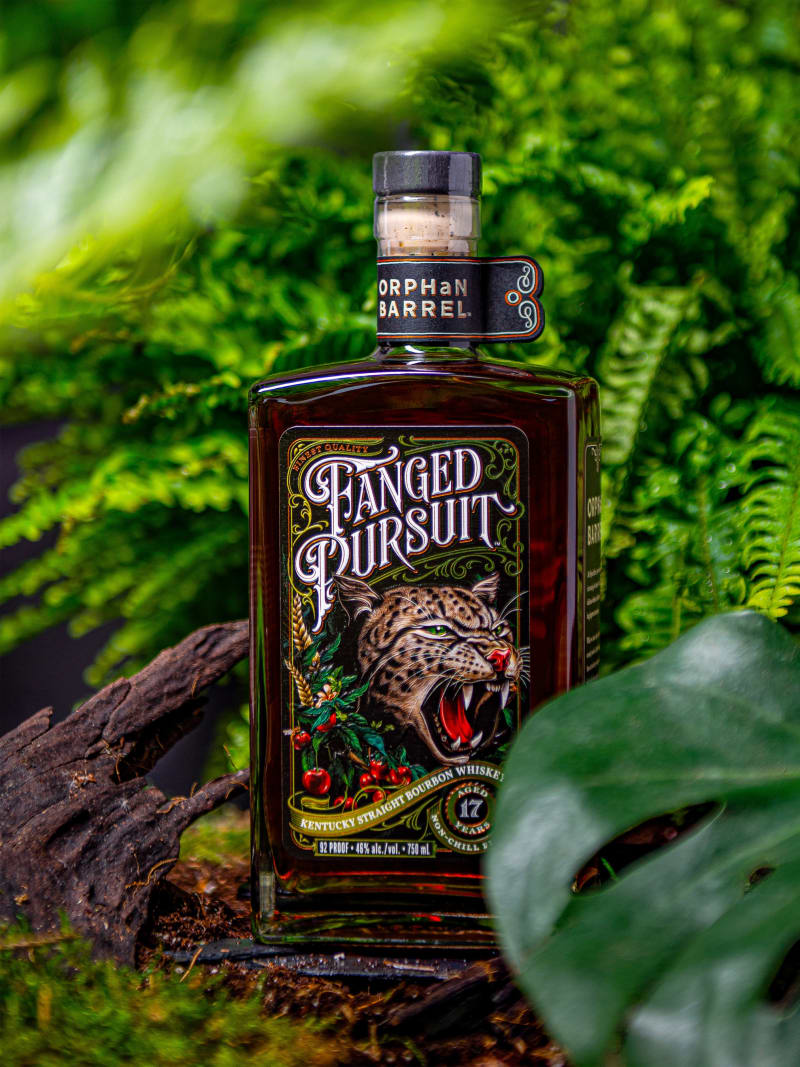 Fanged Pursuit Bourbon Bottle Forest Ferns Natural Setting