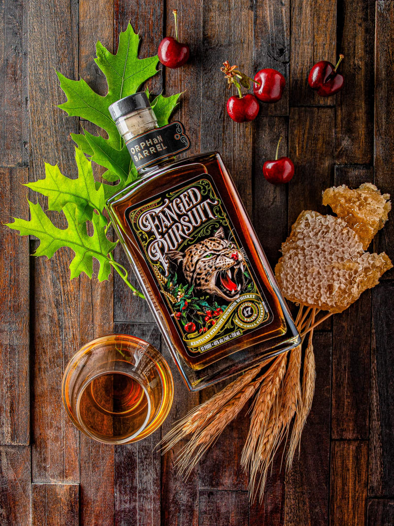 Fanged Pursuit Whiskey Still Life Rustic Wood Cherries