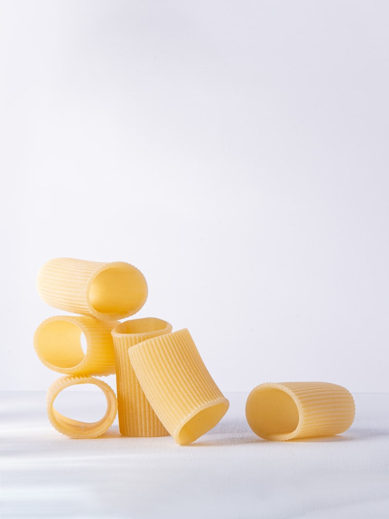 Golden Rigatoni Pasta Tubes Minimalist Food Styling
