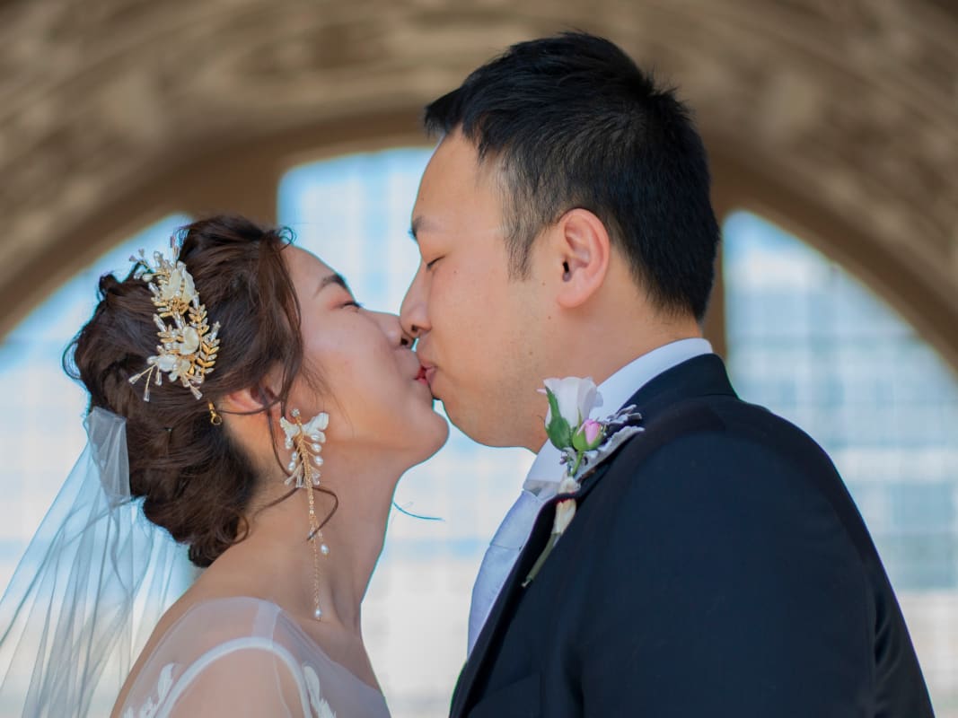 Romantic Wedding Kiss Stone Archway Bride Groom Ceremony