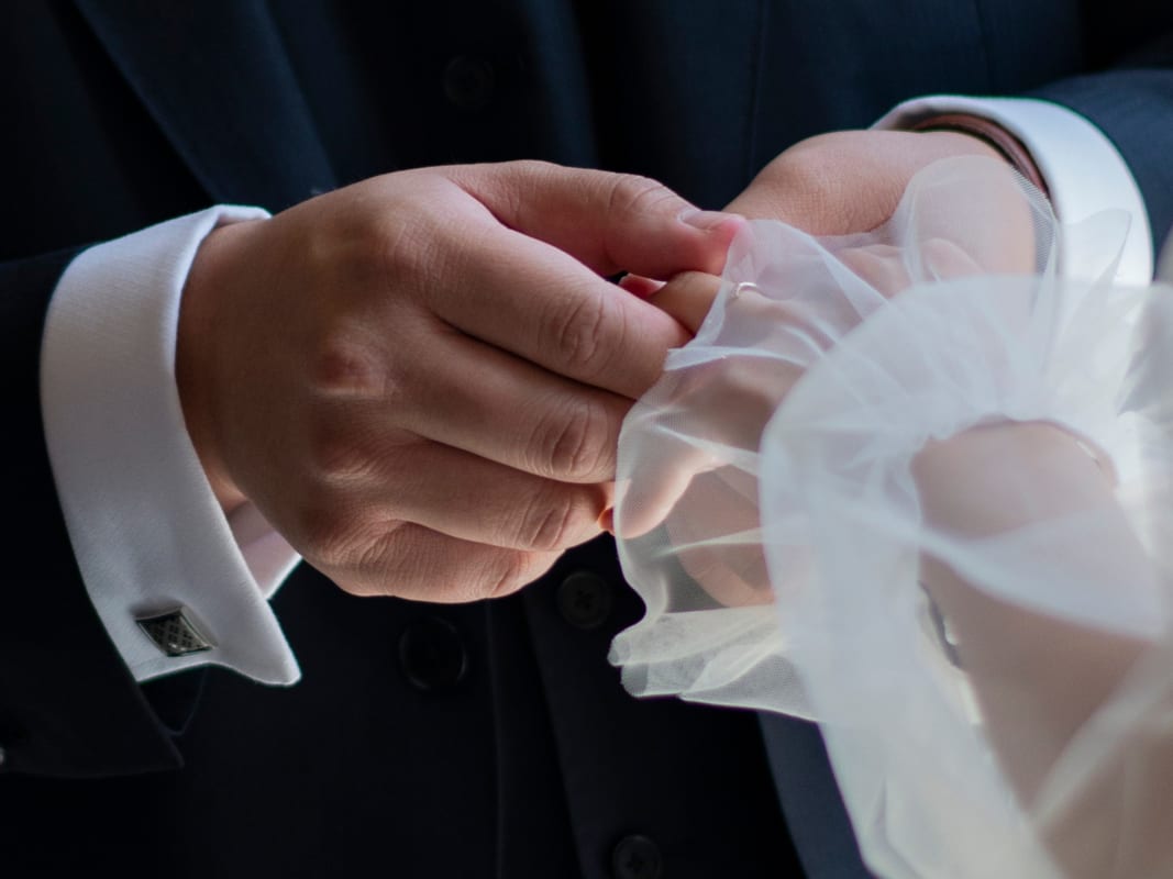Wedding Ceremony Hands Joining Intimate Moment Exchange