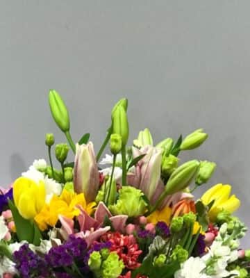 Mixed bouquet with light purple wrapper view 2