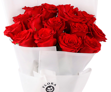 A bouquet of red roses with a white wrapper view 2