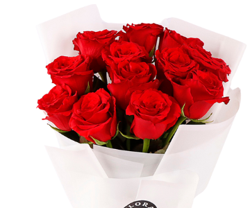 A bouquet of red roses with a red ribbon view 4