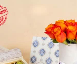 Mix Cookies Box with orange flowers vase view 4