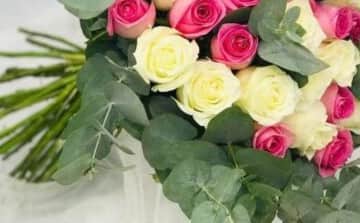 Pink and white flowers bouquet with eucalyptus view 3