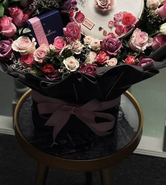 A bouquet of flowers with chocolate accessories5 view 3