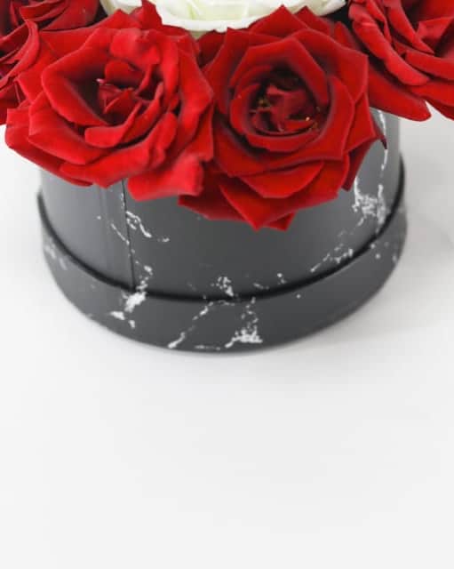 A box of elegant, colorful flowers view 3