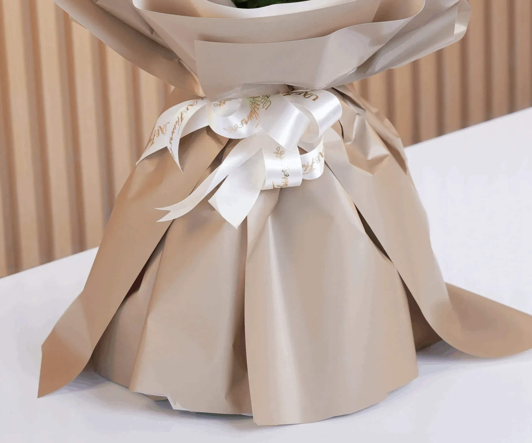 A white and red rose hand bouquet view 5