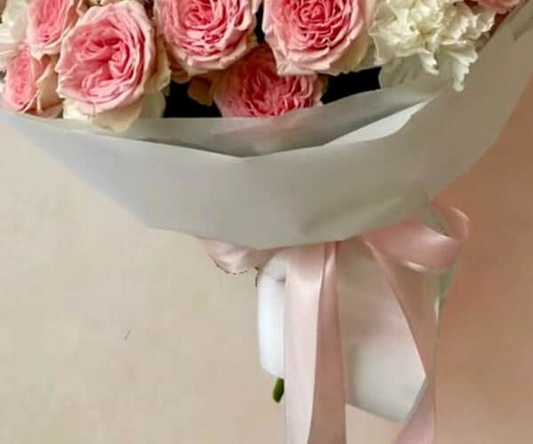 Pink rose bouquet with white wrapping view 3
