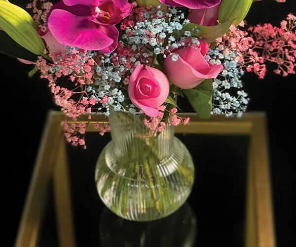 Vase of light flowers view 3