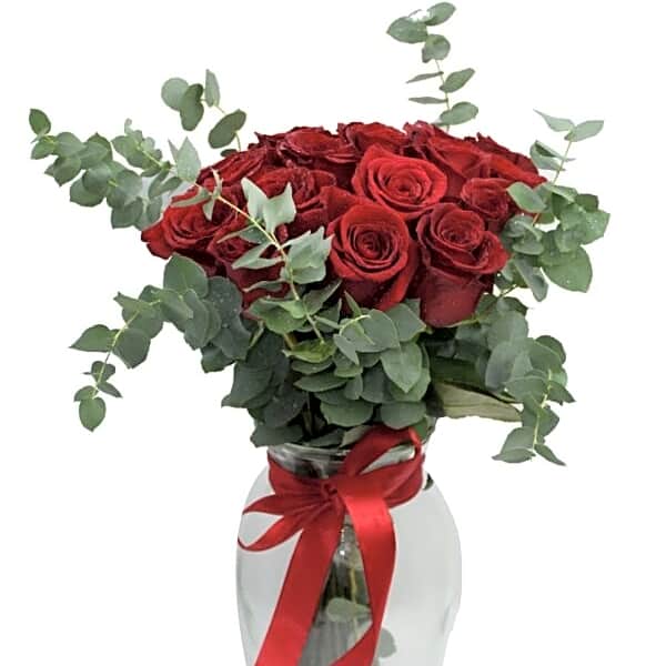 red roses and some eucalyptus with glass N view 1