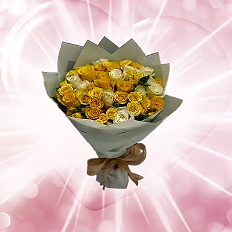 A mixed bouquet of damask roses and baby roses view 1