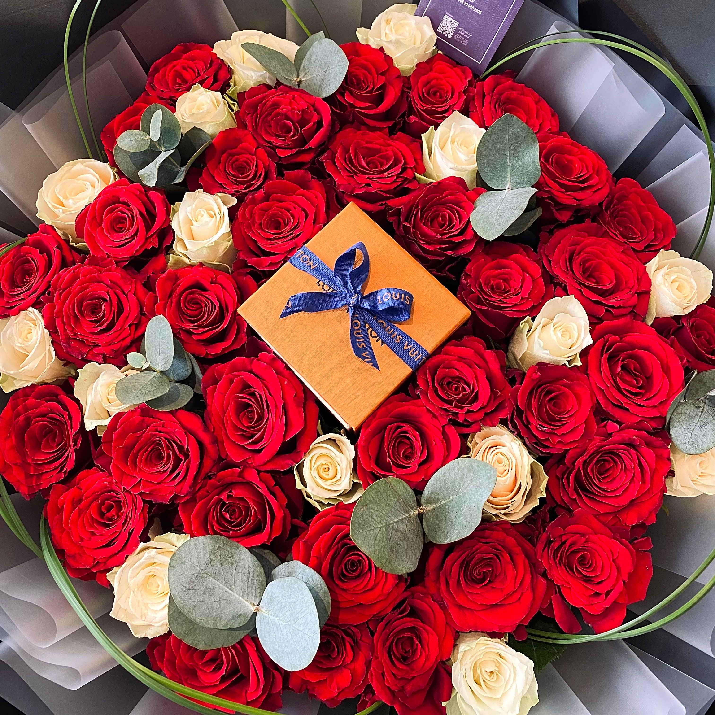 A bouquet of roses with a port view 1