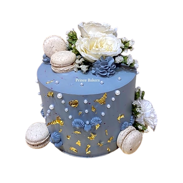 Belgian Chocolate Cake topped with fresh flowers and macrons view 1
