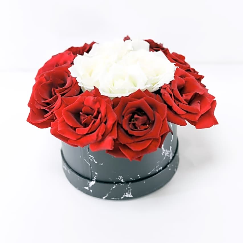 A box of elegant, colorful flowers view 1