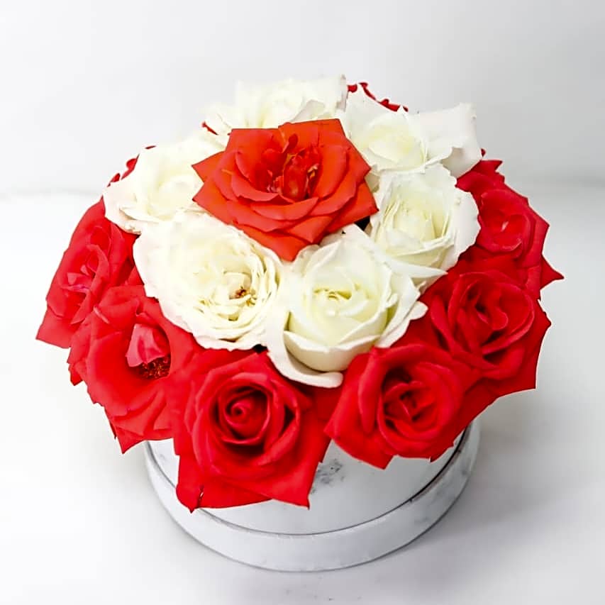 A box of elegant, colorful flowers 3 view 1