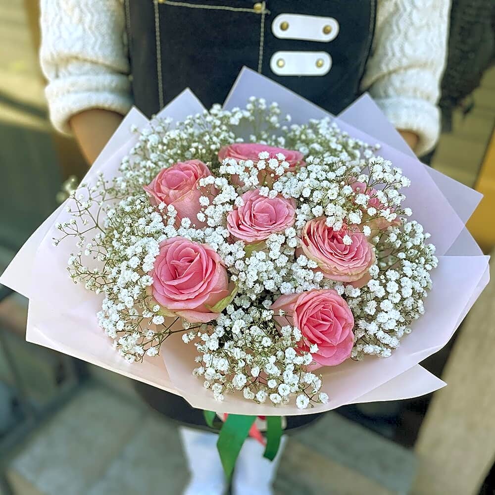 Delicate bouquet with rose and gypsophila view 1