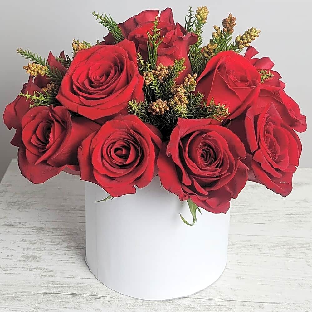 Maroon roses in the white hat box view 1