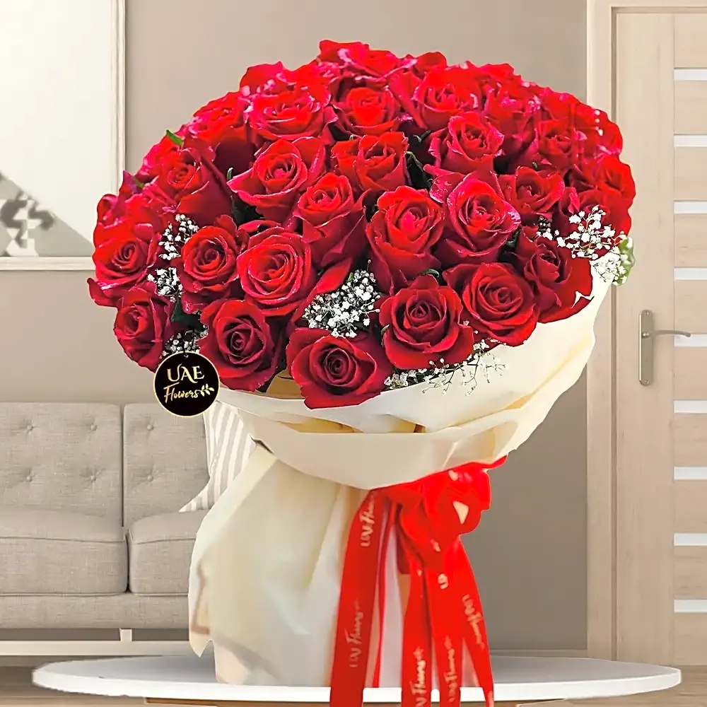 Red bouquet with paper wrapping view 1