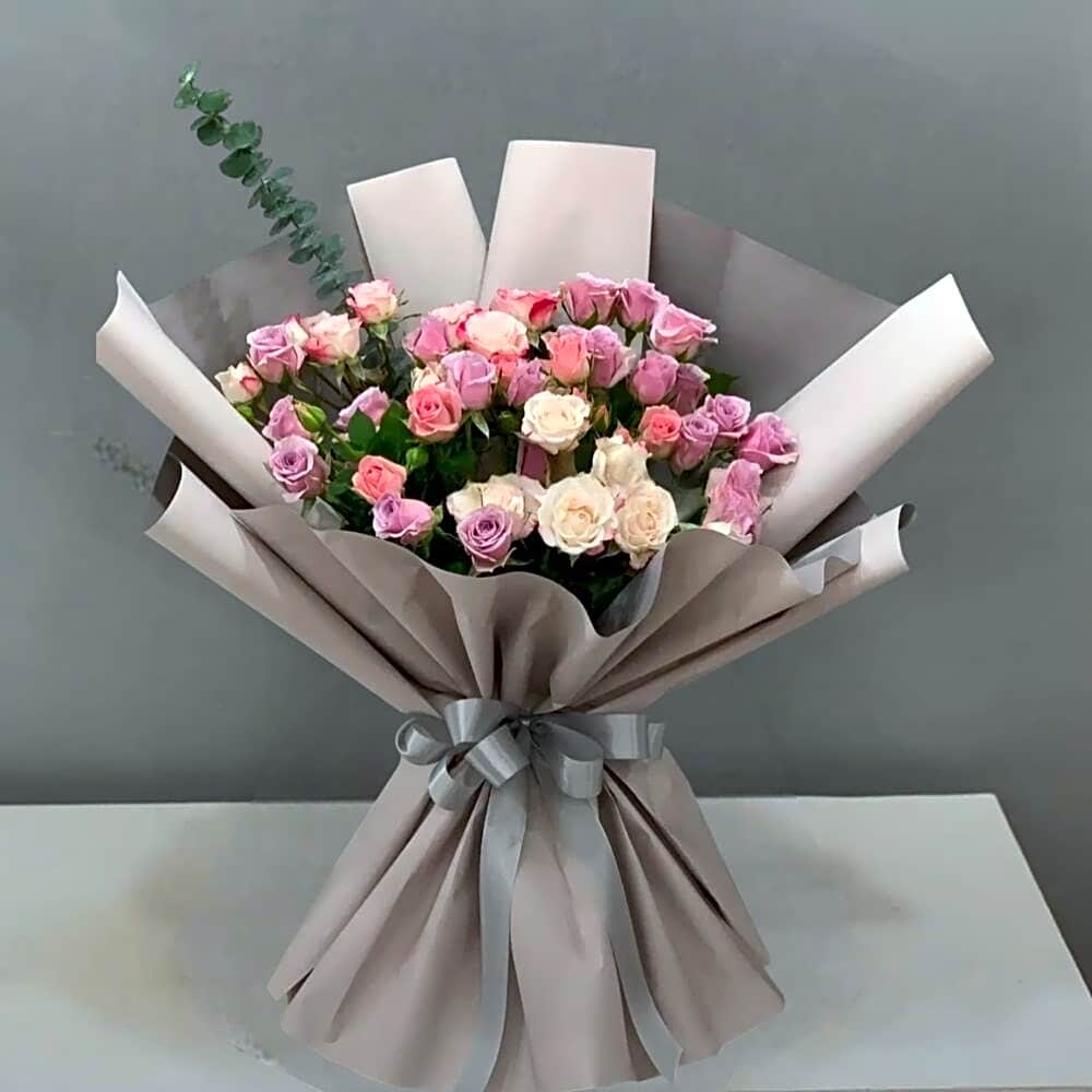 White rose bouquet with white cover view 1