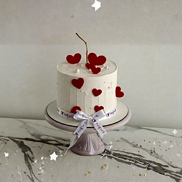 Red Hearts with white butter cream cake - Valentines day cake view 1