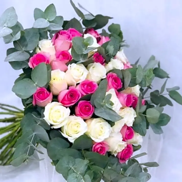 Pink and white flowers bouquet with eucalyptus