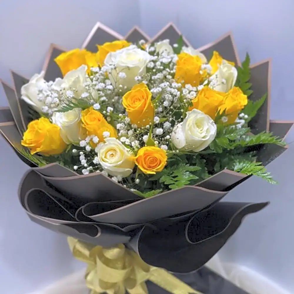 Yellow and white roses bouquet wrapped in black paper N