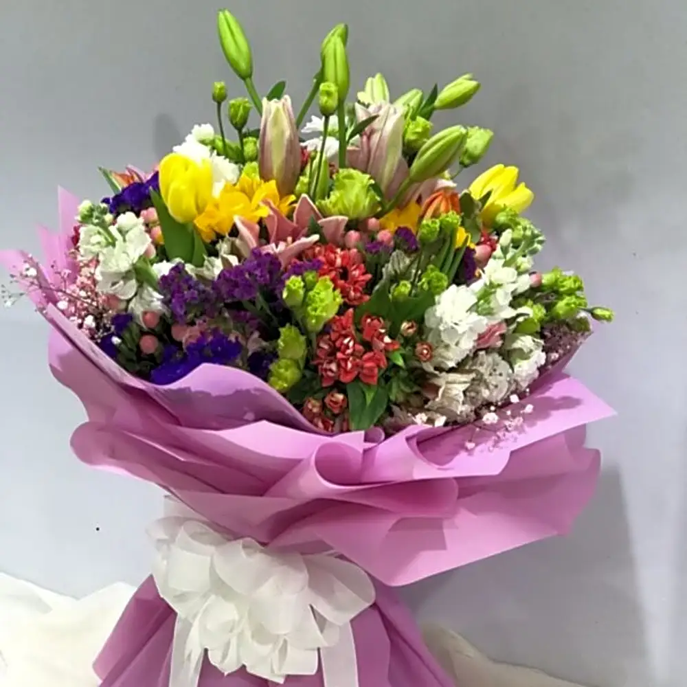 Mixed bouquet with light purple wrapper N