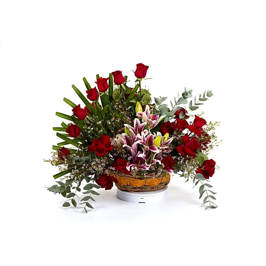 Red box arrangement of pink tulips.