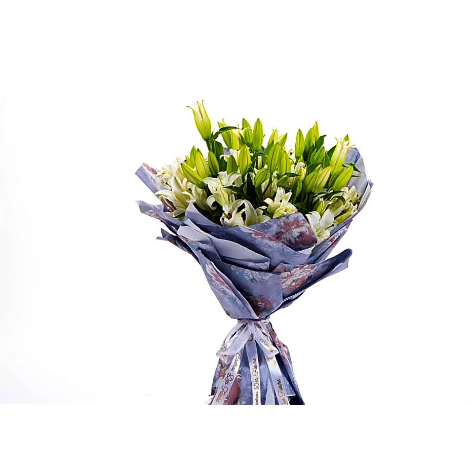 Hand bouquet of white lilies.