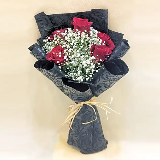 Red rose bouquet with gypsum. 1