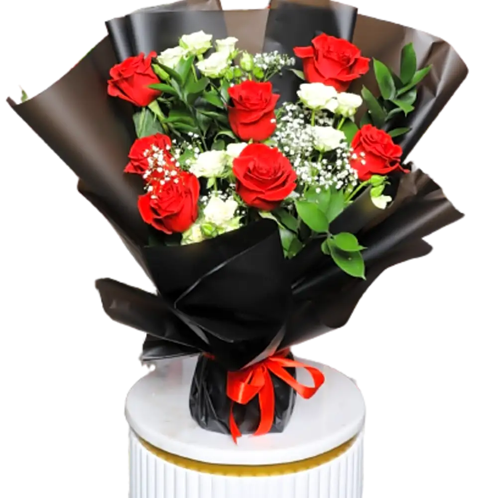 A bouquet of red and white roses