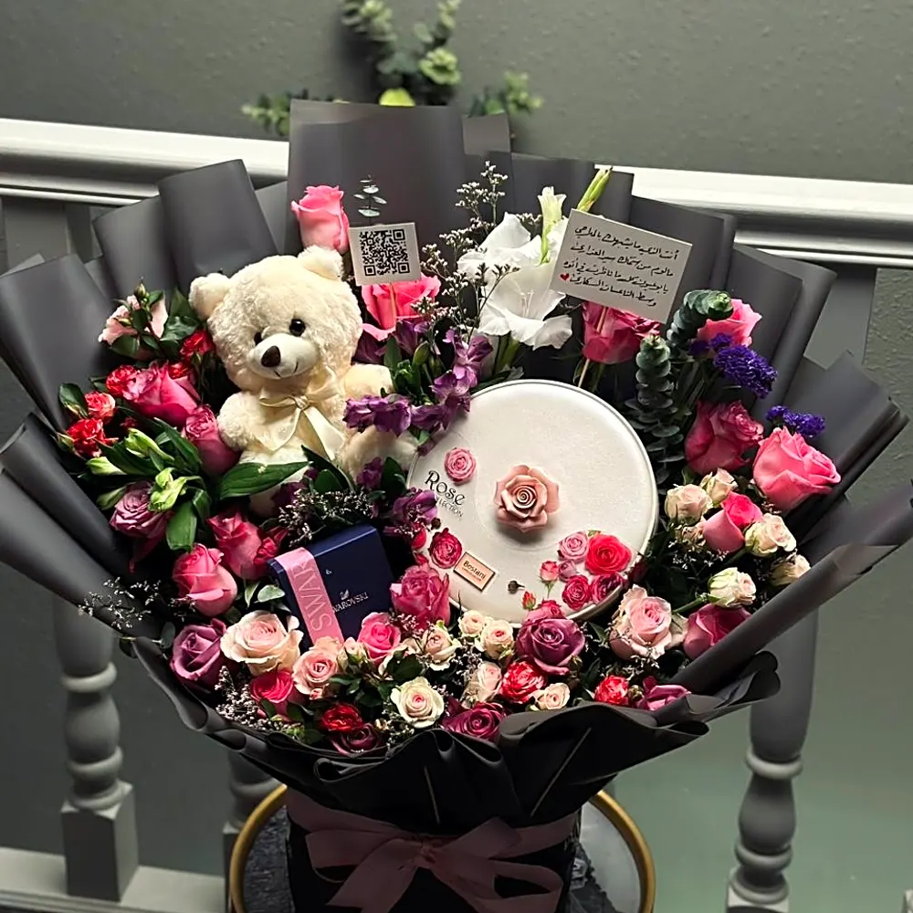 A bouquet of flowers with chocolate accessories5