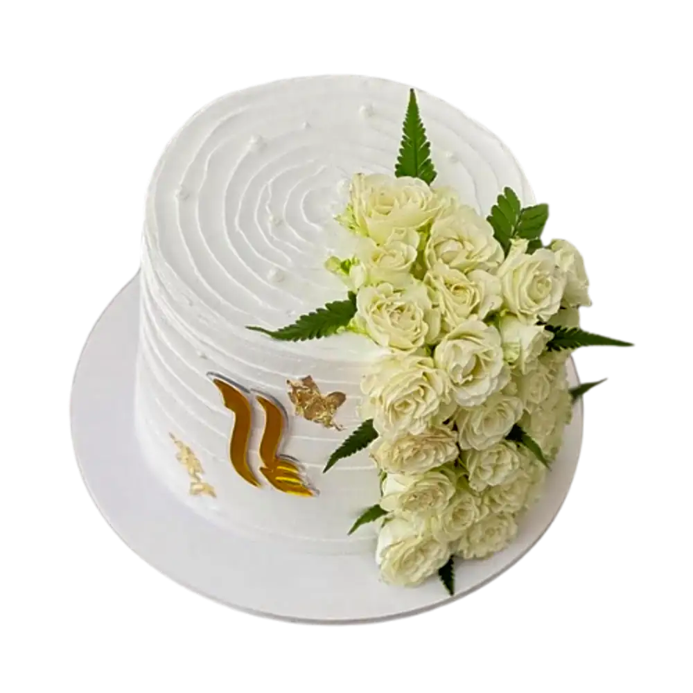 White birthday cake decorated with white roses