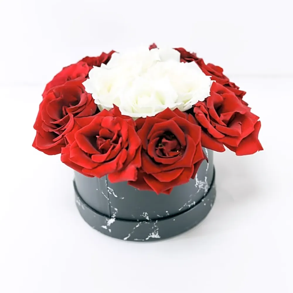 A box of elegant, colorful flowers