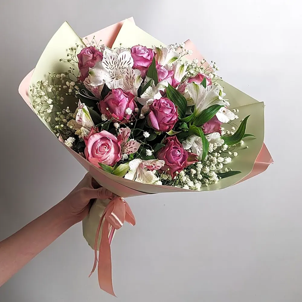 Mixed bouquet of roses, alstroemerias and gypsophila