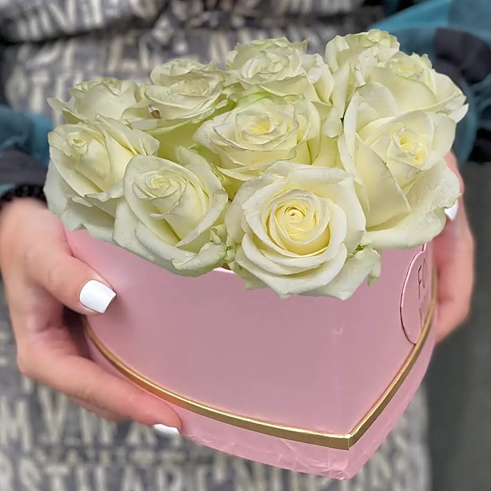 12 white roses in a pink box