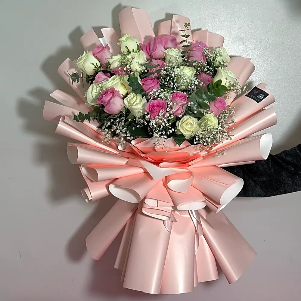 A bouquet of roses with a wonderful wrapper