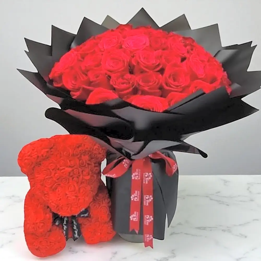 Bouquet with 50 premium red roses, and a red foam Teddy Bear (40cm)