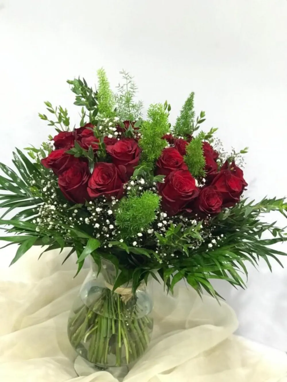 roses red with some leaves