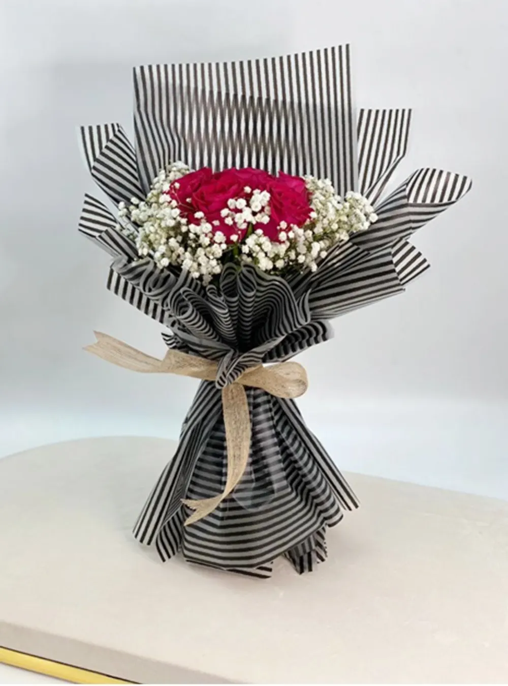 Red rose bouquet with gypsum. 4